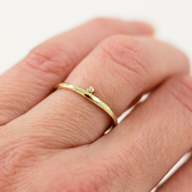 Gold ring with a heart